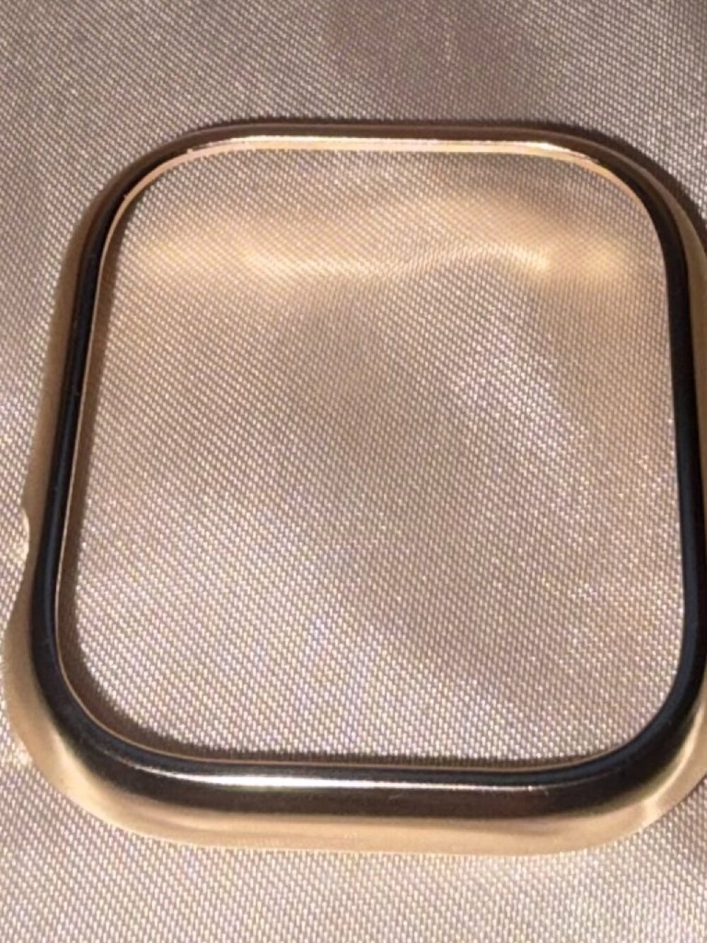 gold Apple Watch cover